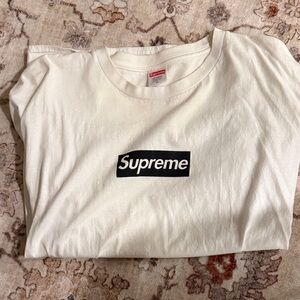 Supreme Paris tee. Has some makeup stains around neckline. 
Size XL